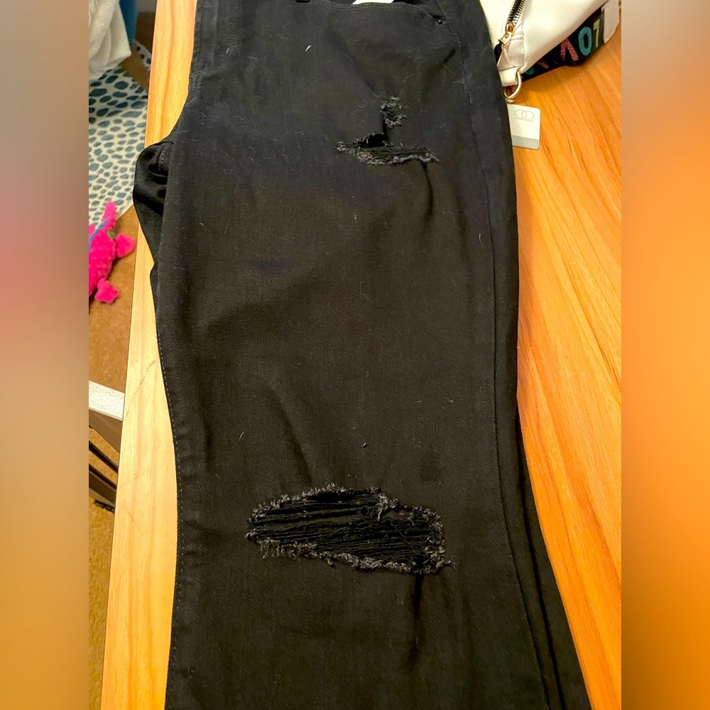 Black distressed jeans. NWT